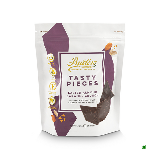 A Butlers 70% Dark Chocolate Salted Caramel & Almond Tasty Pieces Pouch 120g bag contains 120g of Salted Almond Caramel Crunch. This delight features Butler's Chocolate, comprising 70% dark chocolate with salted caramel and almonds.