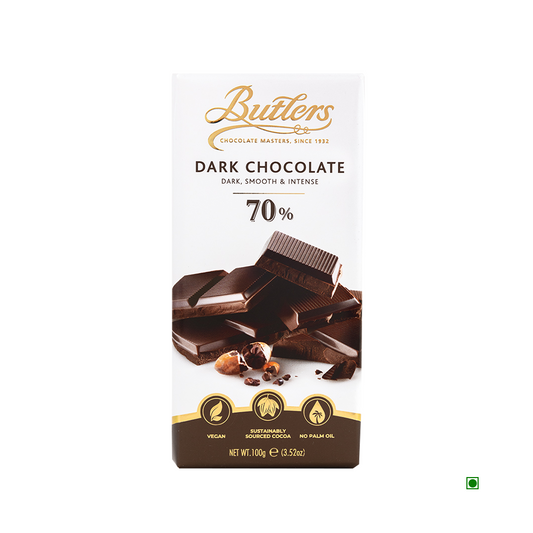 A Butlers 70% Dark Chocolate Bar 100g from Ireland, boasting 70% cocoa in white packaging. The label highlights it as vegan, sustainably sourced, and free from palm oil.