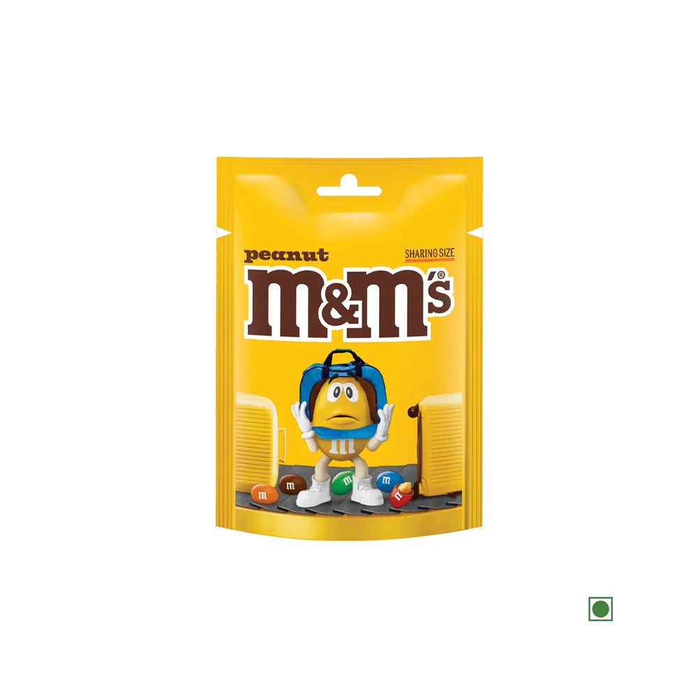 A yellow 200g pouch of M&M's Peanut showcases a cartoon peanut character wearing headphones, standing with arms open next to scattered chocolates.