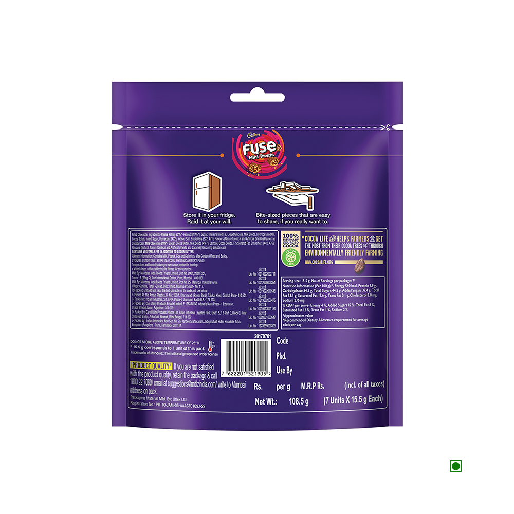 Back view of a purple packaged Cadbury Fuse Chocolate Bites Home Treats Pack 108.5g, featuring nutritional information, storage instructions, and branding details. These bites offer a crunchy chocolate experience made with sustainably sourced cocoa, enhancing their rich flavor and irresistible appeal.