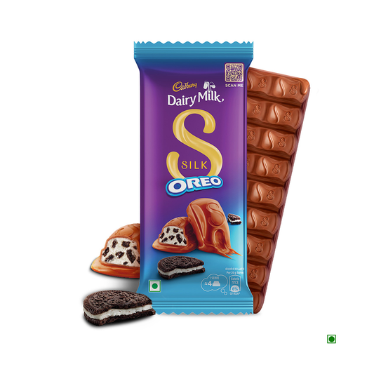 The Cadbury Dairy Milk Silk Oreo Chocolate Bar 130g, partially unwrapped, showcases its tempting creamy Oreo center. An ideal choice for a chocolate gift pack, this delight from Cadbury is a luxurious treat guaranteed to please any chocolate enthusiast.