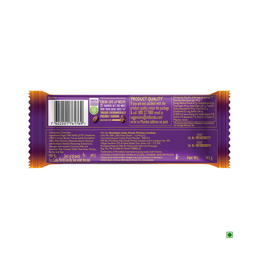 The back of this Cadbury Dairy Milk Silk Hazelnut Chocolate Bar 143g package, featuring vibrant purple and orange colors, provides details about its rich ingredients, such as hazelnuts blended with creamy milk chocolate. It also includes comprehensive nutrition facts and essential manufacturer information, proudly presented by Cadbury.