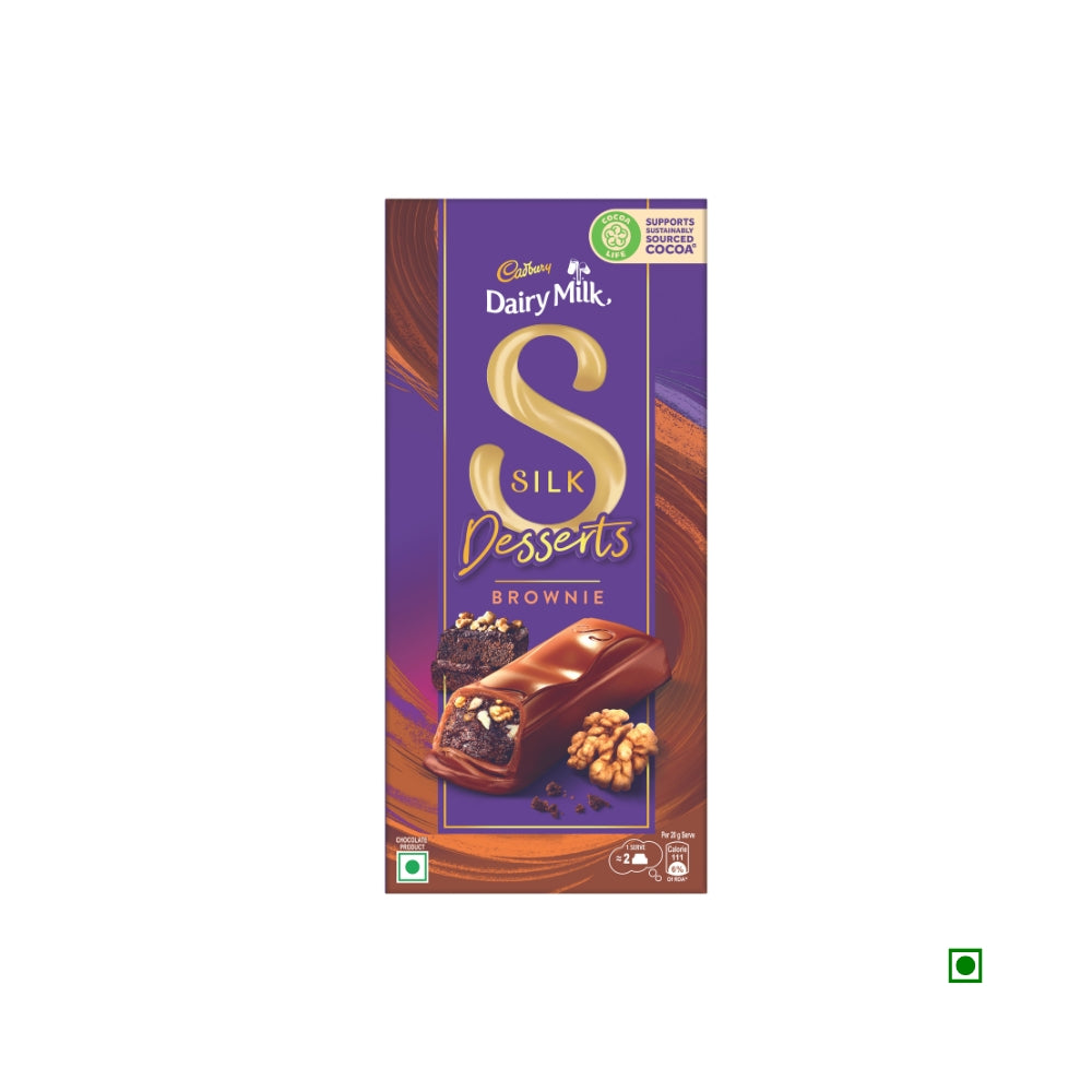 Image of a Cadbury Dairy Milk Silk Dessert Walnut Brownie 140g chocolate bar packaging from India. The purple and brown wrapper showcases a sliced chocolate bar with brownie and walnut pieces inside, under the Cadbury brand.