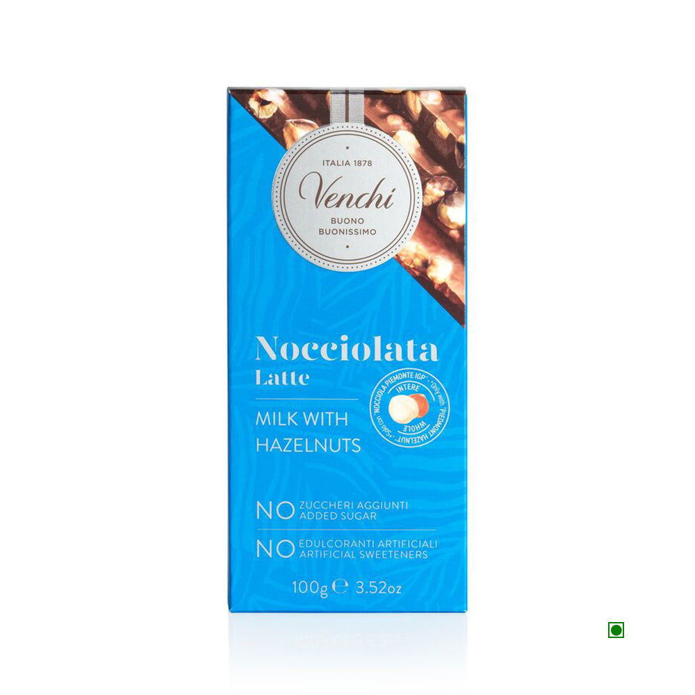 The Venchi Latte Milk No Added Sugar Bar (70g) features an elegant blue packaging that showcases a delightful cocoa and milk blend with hazelnuts. Enjoy this guilt-free indulgence with no added sugar or artificial sweeteners.