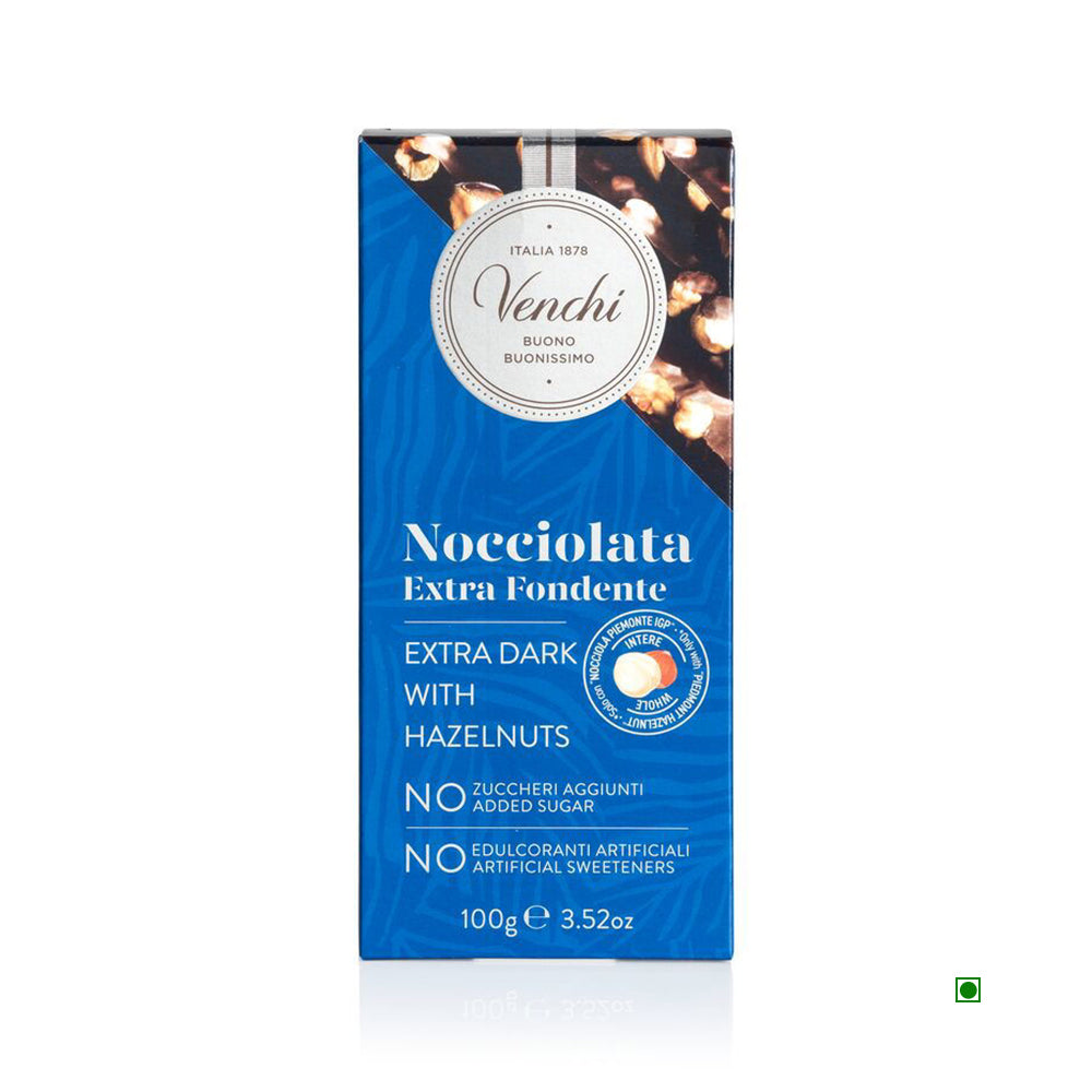 Venchi's Extra Dark With Hazelnut No Added Sugar Bar 100g blends rich extra dark chocolate with PGI Piedmont hazelnuts, offering an indulgent treat without added sugar or artificial sweeteners.