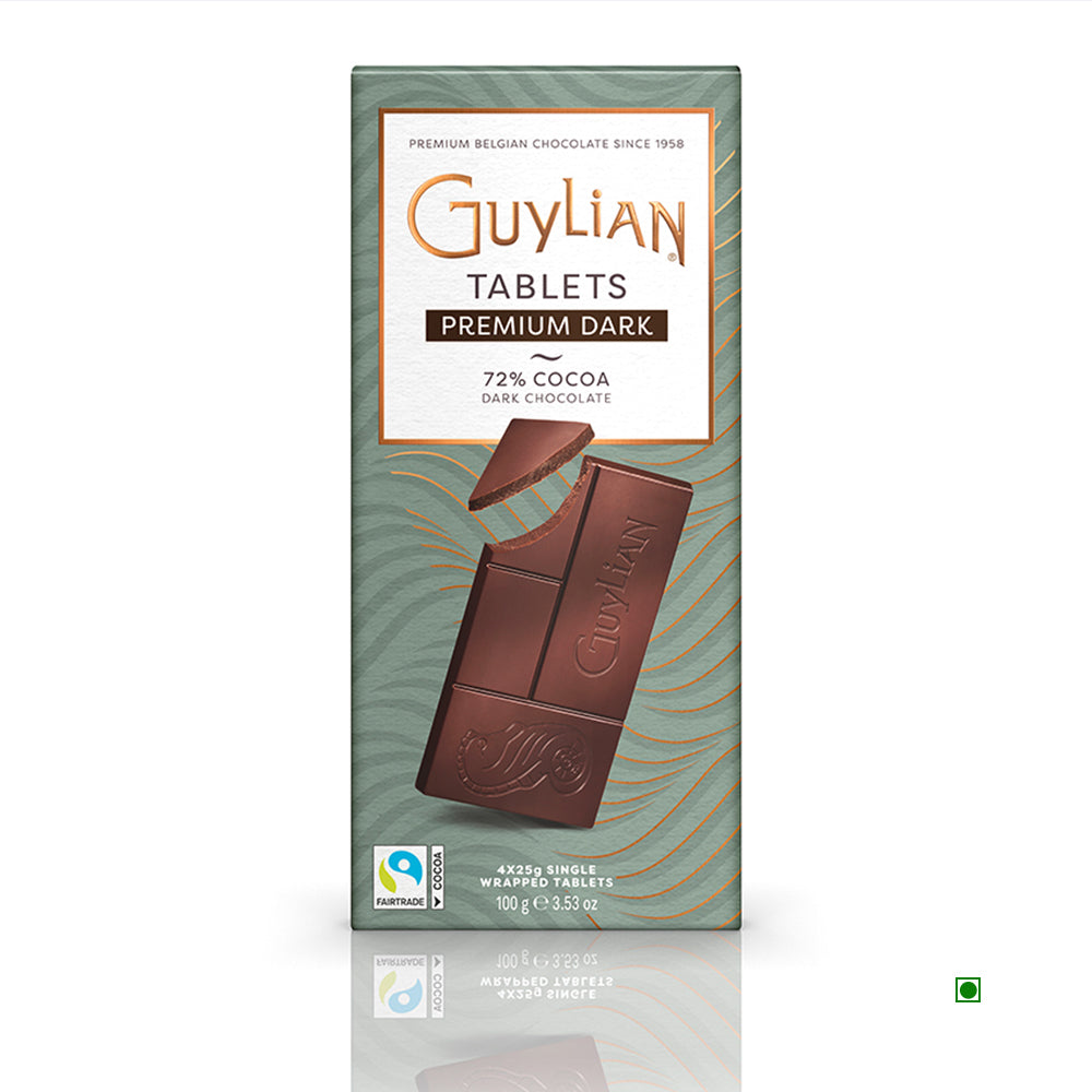 The Guylian 72% Dark Chocolate Tablet 100g features a refined blend of 72% cocoa, with packaging that emphasizes its Belgian heritage set against a wavy patterned background and a tempting image of a chocolate bar segment.