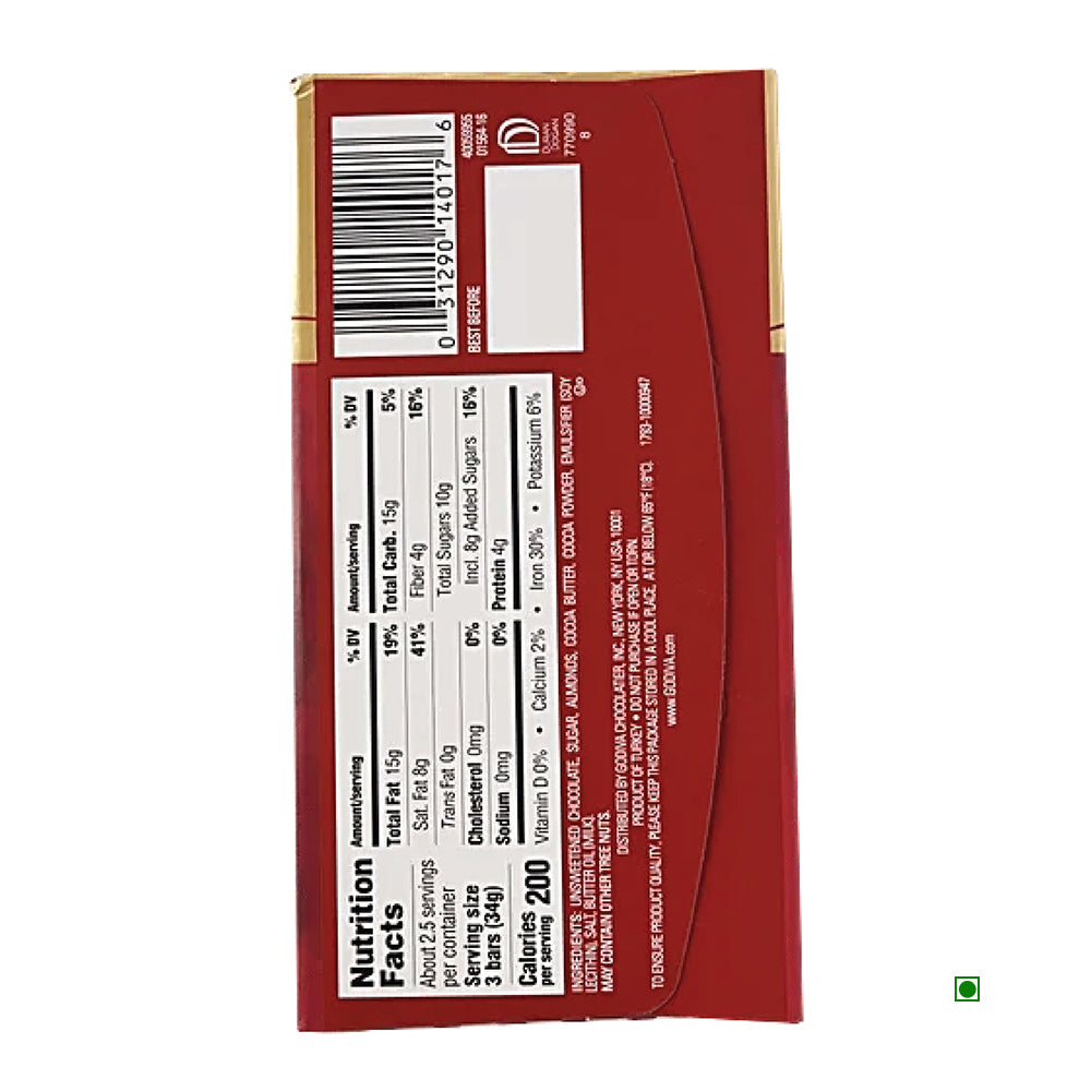 The back of the Godiva Roasted Almond Dark Chocolate Sticks 90g package features an elegant red and gold design, proudly displaying its Country of Origin: Turkey. The package includes detailed nutritional information and ingredients for your enjoyment.