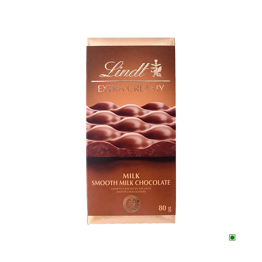 Lindt Extra Creamy Milk Tablet 80g, by Lindt, features a wavy chocolate design on its packaging and is made in France.
