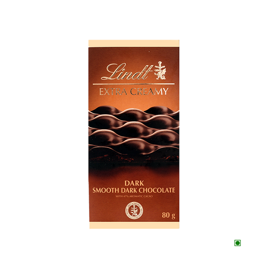 Front view of Lindt Extra Creamy Dark Tablet 80g, featuring a wavy chocolate design on the packaging; a smooth dark chocolate bar by Lindt, made in France.