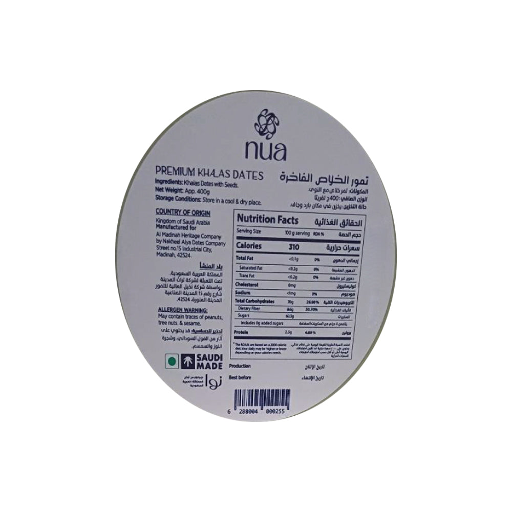 Label of a product named "Nua Khalas Dates Cylinder 400g" showing ingredients, country of origin as Saudi Arabia, nutrition facts, and a "Saudi Made" mark.