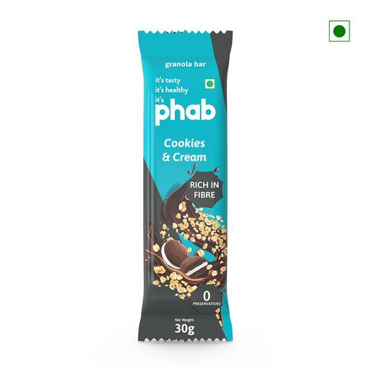 A granola bar package labeled "Phab Granola Bar Cookie & Cream 30g," packed with fiber, features enticing images of cookies and granola on the wrapper. This delicious snack, weighing 30 grams, is proudly made in India by Phab.