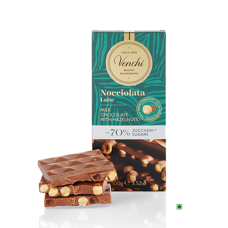 A Venchi Milk Chocolate Hazelnut -70% Sugars Bar 100g with a bar of nougat.