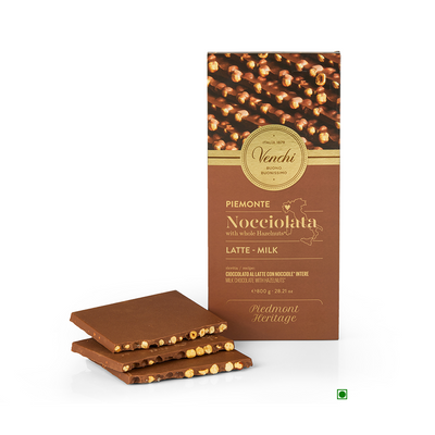 A Venchi Milk Chocolate with Hazelnuts Maxi Bar 800g from Italy, adorned with a label.