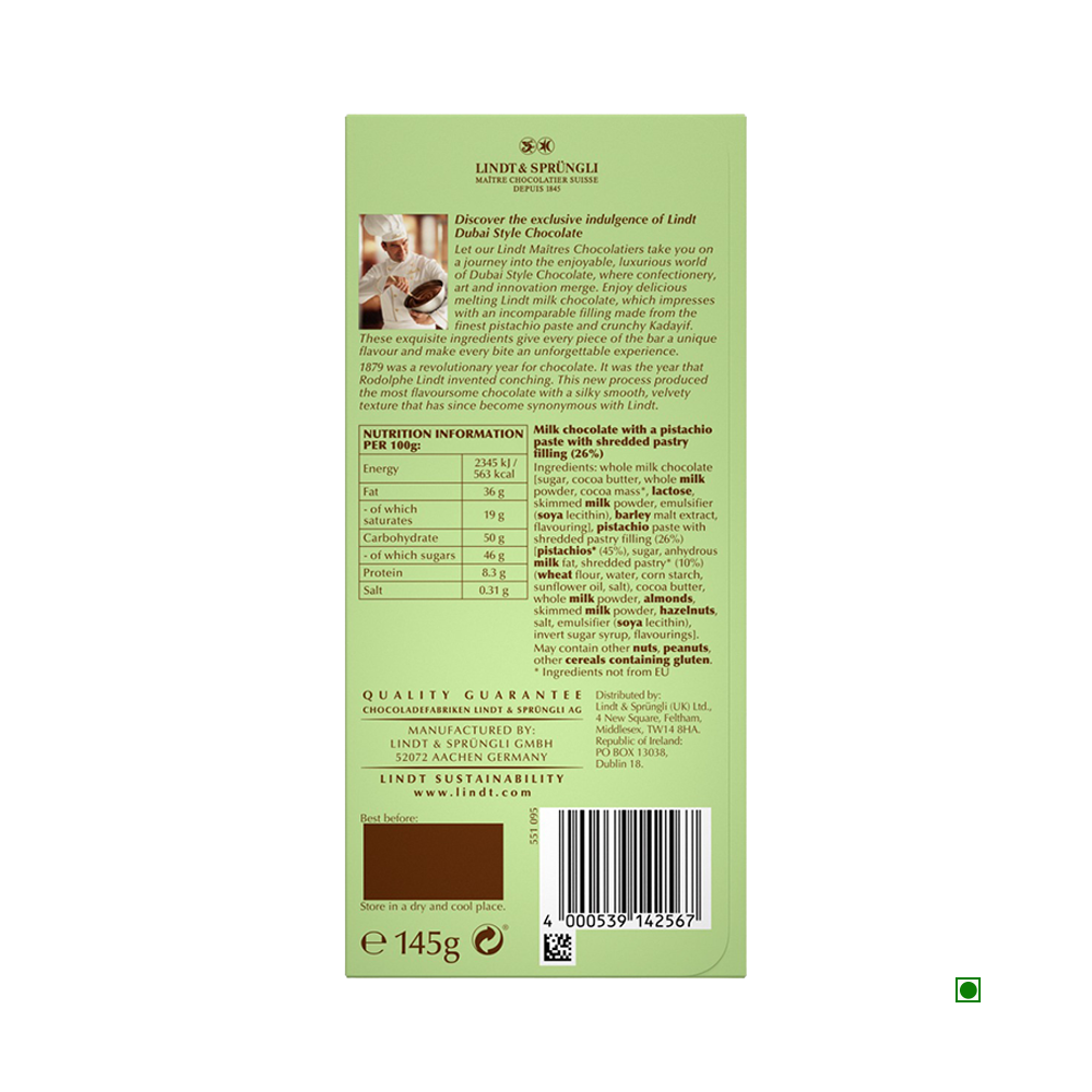 Back of a Lindt Dubai Chocolate 145g bar showing product description, ingredients such as pistachio filling and nut brittle, nutrition facts, Lindt branding, manufacturer info, barcode, and 145g net weight.