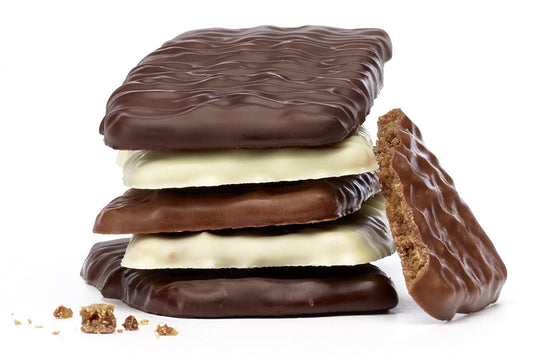 A stack of Jules Destrooper Belgian Chocolate Thins 100g bars on a white background.