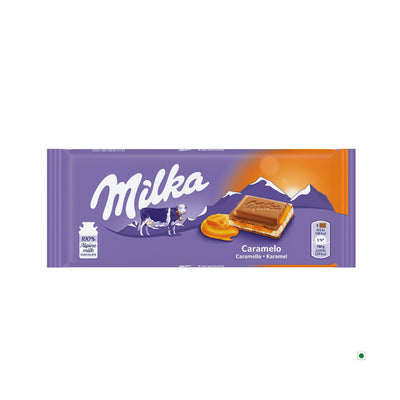A Milka Caramel Milk Chocolate Bar 100g with a cow on it.