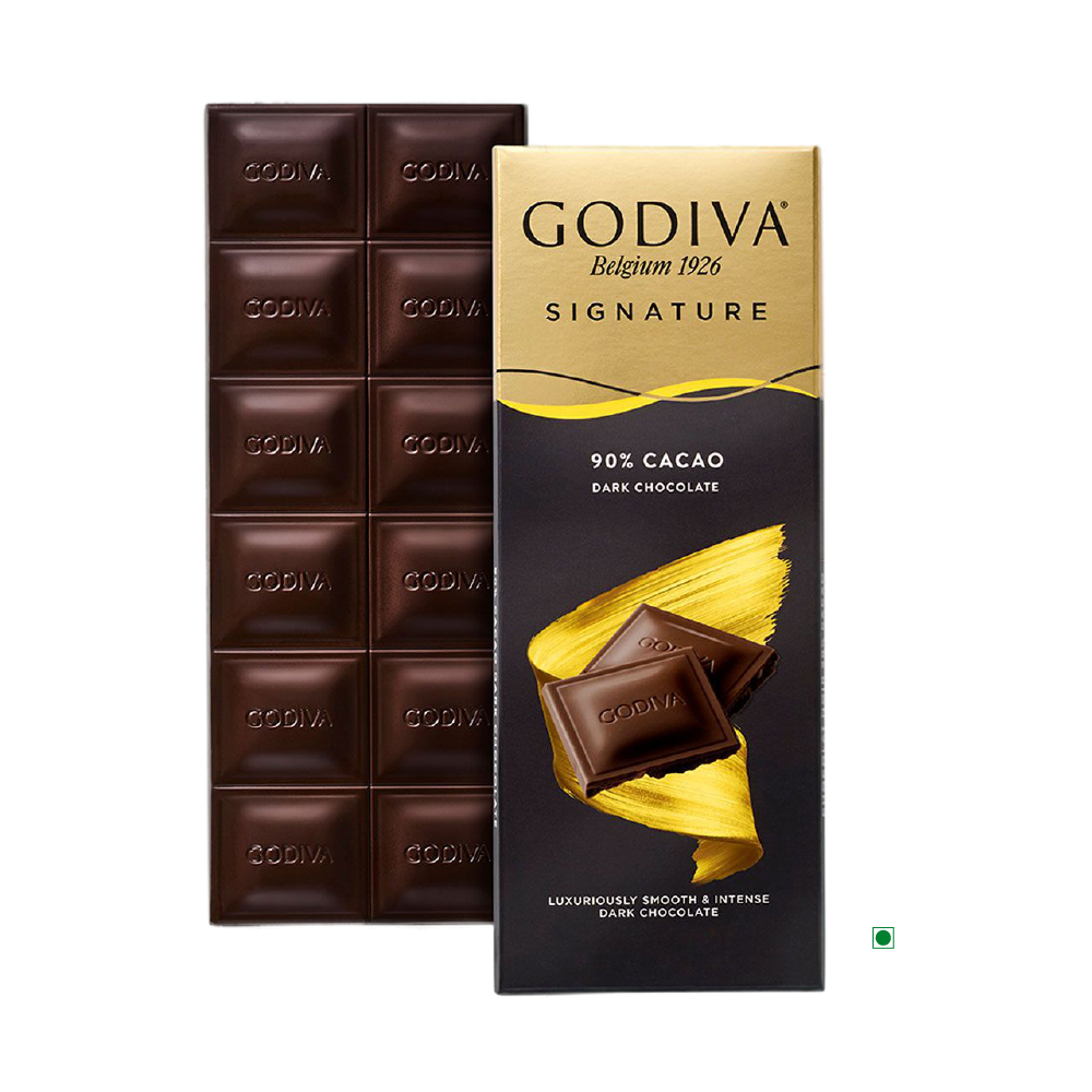 A Godiva Dark 90% Bar 90g is partially unwrapped, showcasing the luxurious chocolate squares within, skillfully crafted in Belgium by the renowned brand Godiva.