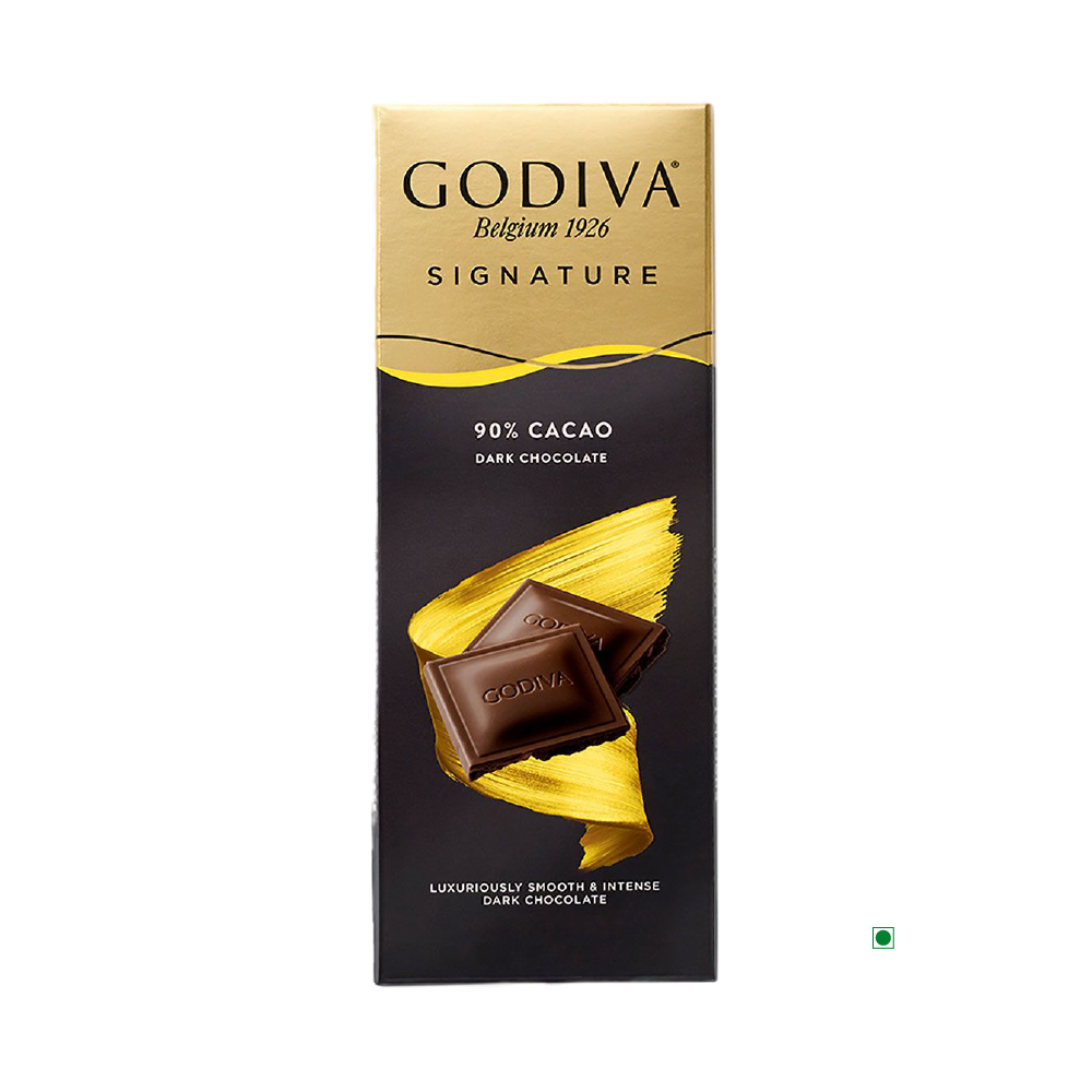 The Godiva Dark 90% Bar 90g is a decadent treat from the brand Godiva, featuring a high cacao content of 90%. Elegantly wrapped in black and gold packaging, it is crafted in Belgium and adorned with images of chocolate pieces, delivering a rich and intensely smooth dark chocolate experience.