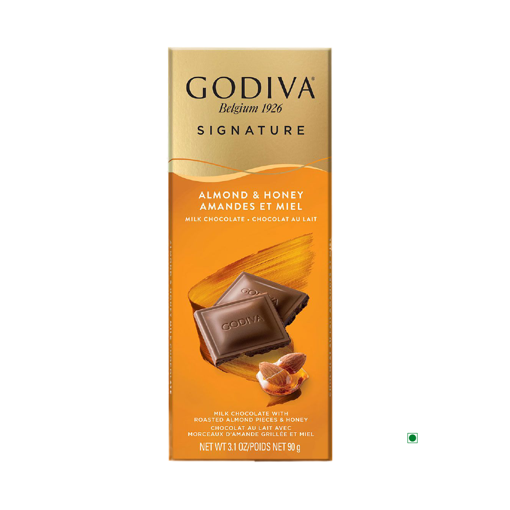 A Godiva Milk Honey Almond Bar 90g, with its packaging showcasing roasted almonds and sweet honey, embodies the rich tradition of a classic Belgian chocolate bar.