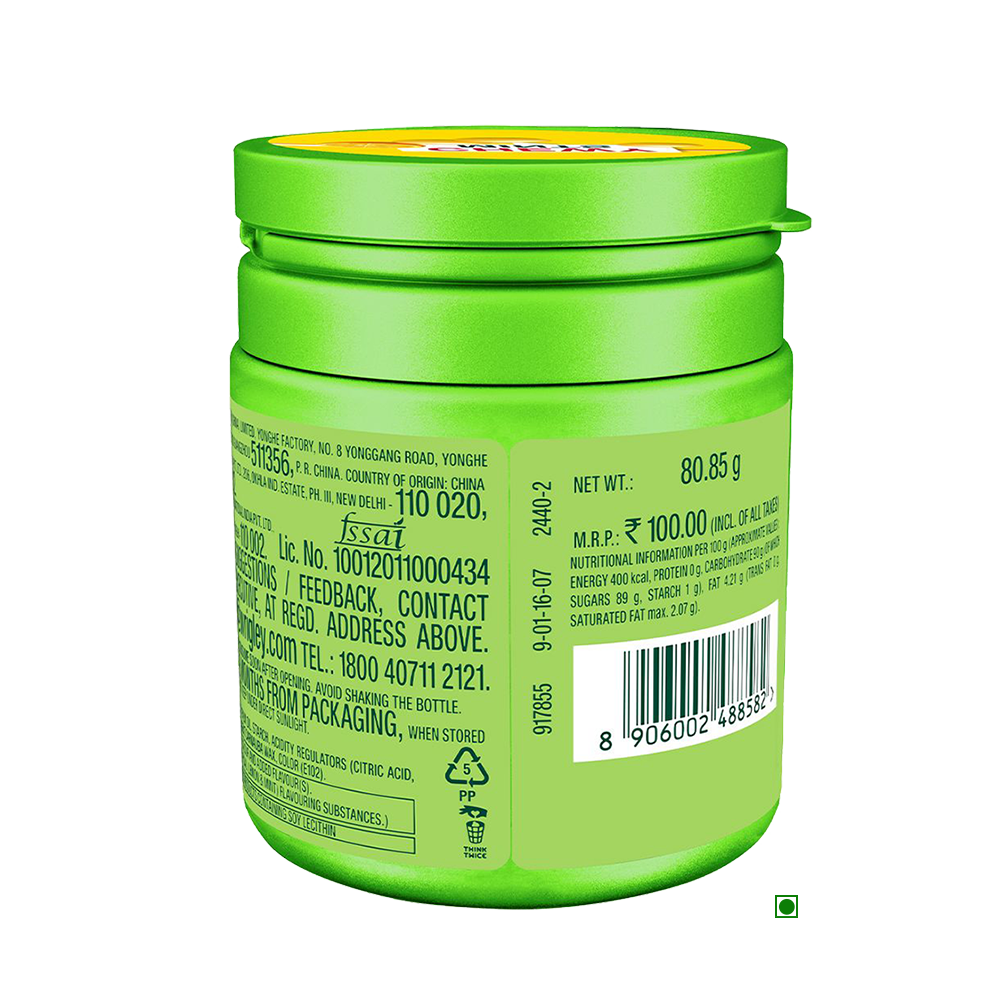 A green jar with a label on it containing Wrigley's Doublemint Chewy Mints, Lemon, 80.85g.