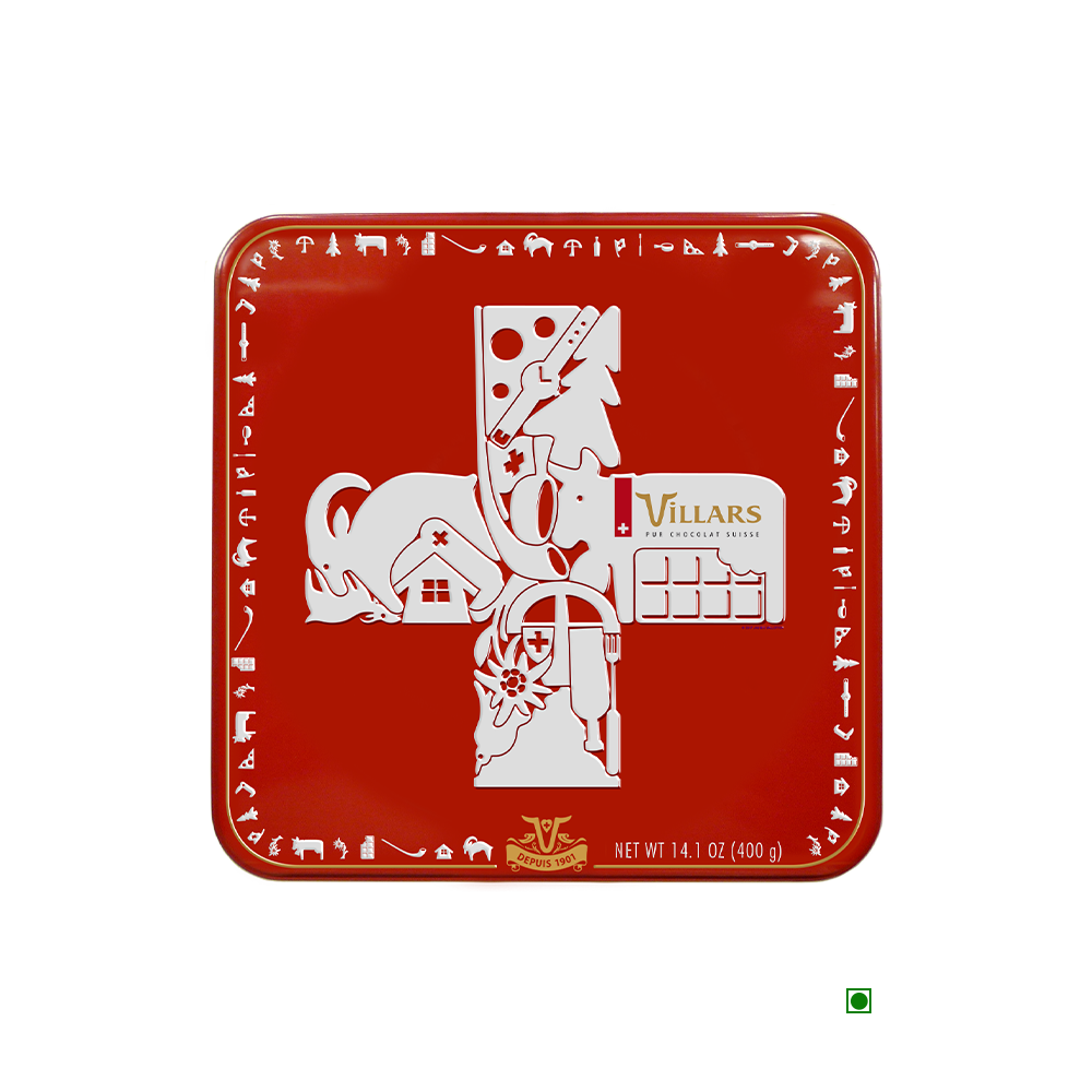 A Villars Milk Napolitains Tin Box 400g with an image of a cross on it.