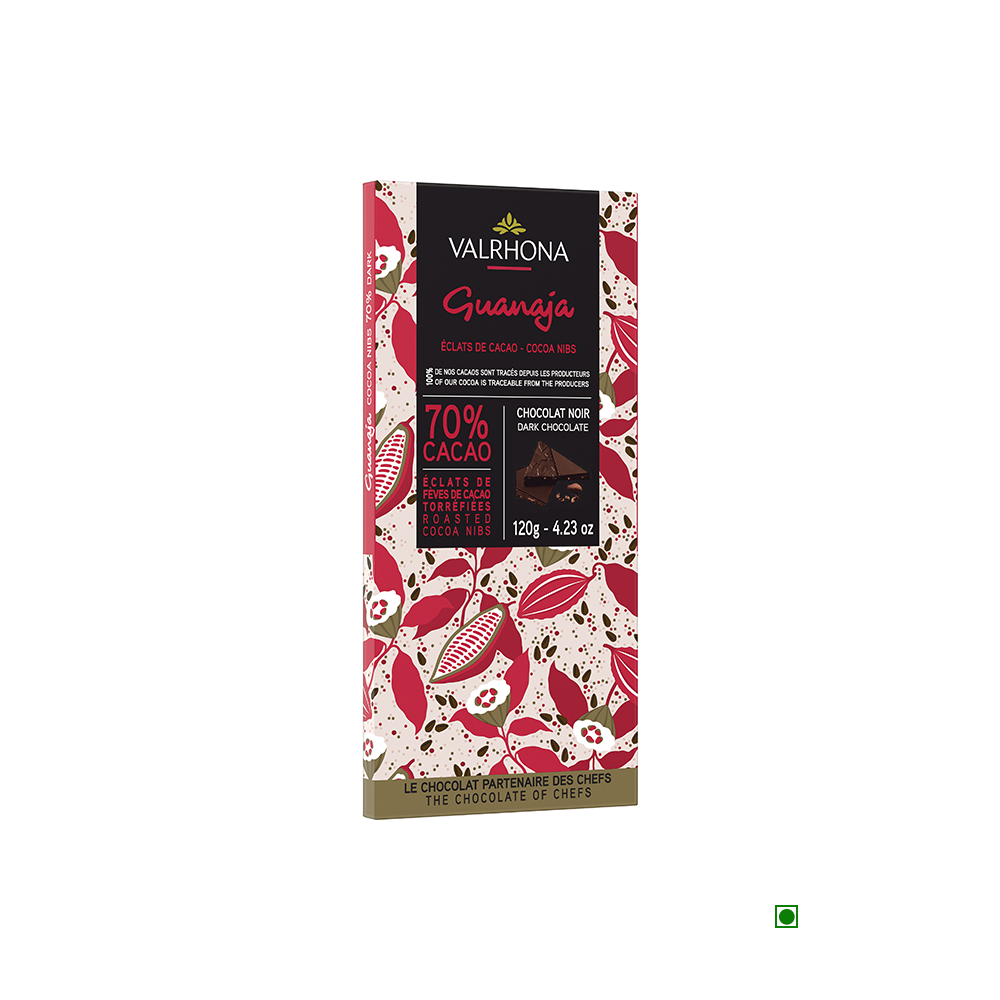 A Valrhona Guanaja Cocoa Nibs 70% Bar 120g with pomegranate on it.