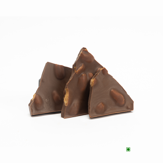 Three pieces of Rhine Valley Almond Milk chocolate, featuring creamy milk chocolate with freshly roasted almonds inside, are arranged in a pyramid formation on a white background.