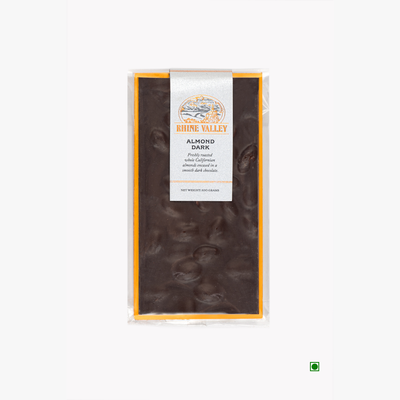 A Rhine Valley Almond Dark 100g chocolate bar in a package on a white background.