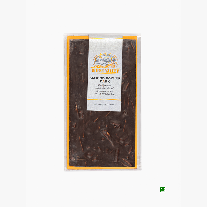 A Rhine Valley Almond Rocher Dark 100g chocolate bar in a package with a label on it.