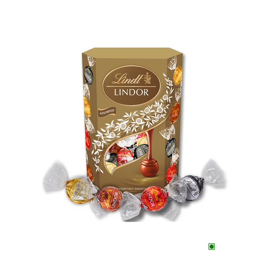 A box of Lindt Lindor Chocolate Cornet Assorted 337g, featuring a variety of wrapped chocolate truffles crafted from the finest ingredients and filled with a smooth melting center, scattered around it.