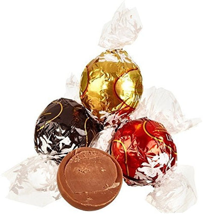 A group of Lindt Lindor Assorted Cornet 200g chocolates on a white background.