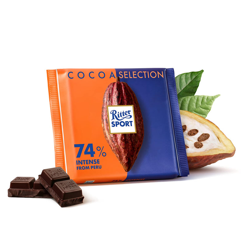 A Ritter Sport 74% Intense Dark Chocolate Bar 100g with a chocolate selection on it.