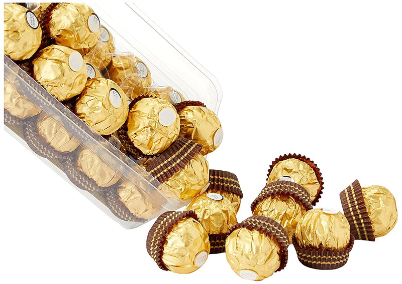 Ferrero Rocher chocolates in a clear container.