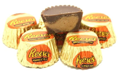 A group of Hershey's Reese Peanut Butter Cup Bag 298g on a white background.