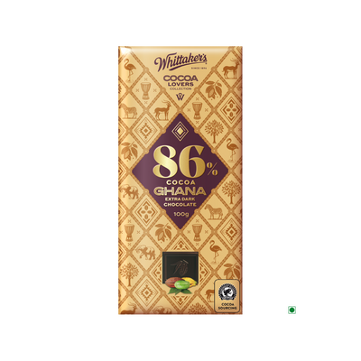 A Whittaker's Whittakers 86% Ghana Extra Dark Bar 100g, with Fairtrade and Rainforest Alliance certifications on the packaging.