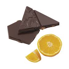 A Valrhona Manjari Orange Peel 64% Bar 120g with an orange slice next to it.